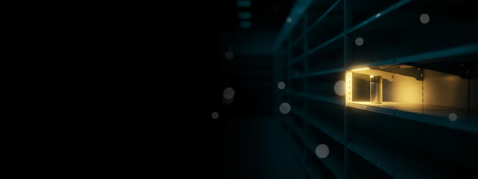 A retail aisle after closing with one shelf section lit from within, a single plain product standing in the glow.